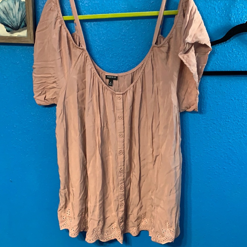 Torrid size 4 Blush top with detail on bottom.